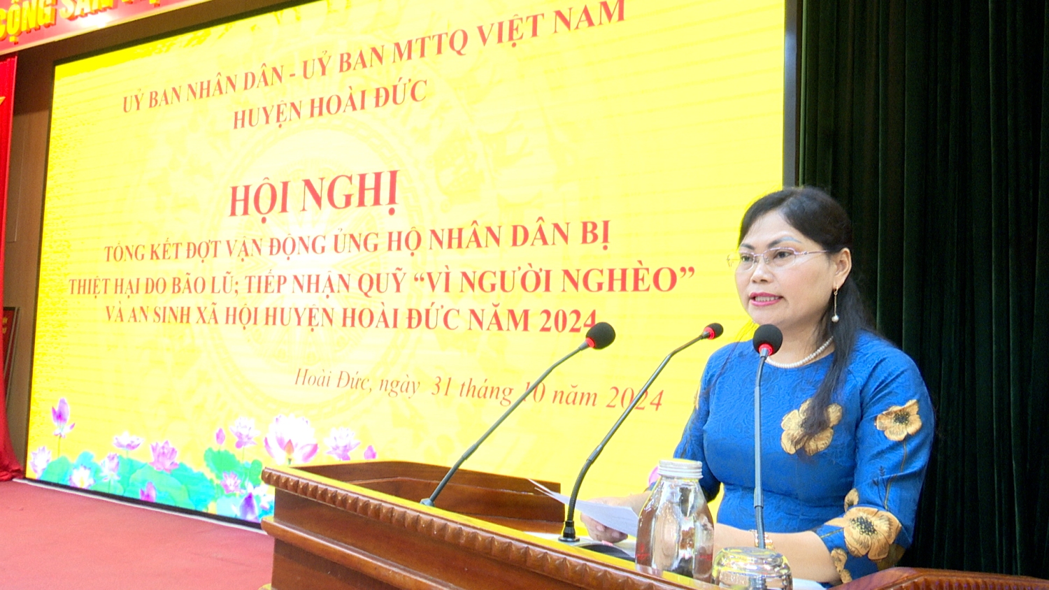 Đồng chí Nguyễn Thanh Tú - Ủy viên BTV, Chủ tịch UB MTTQ huyện báo cáo kết quả vận động xây dựng quỹ 'Vì người nghèo' huyện
